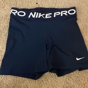 Women’s navy small Nike pros